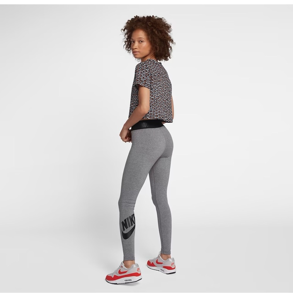 Nike women’s size small leg a see leggings , gray, and black color